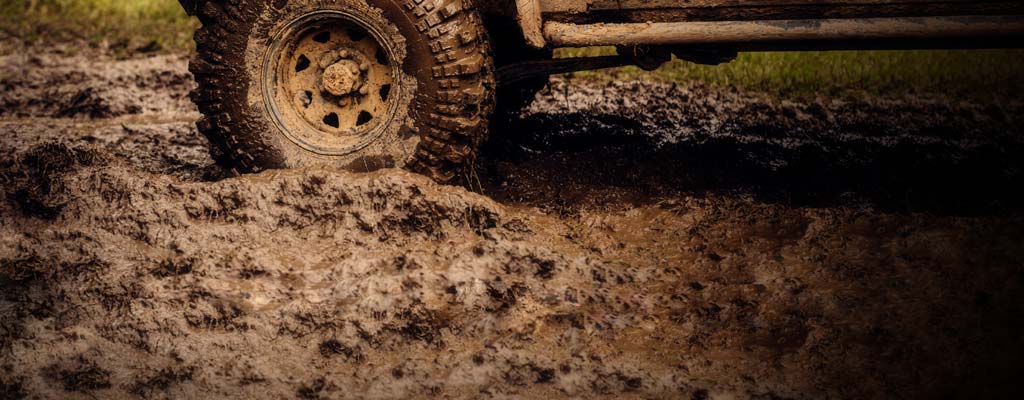 How to Get a Car Unstuck From Mud | Les Schwab